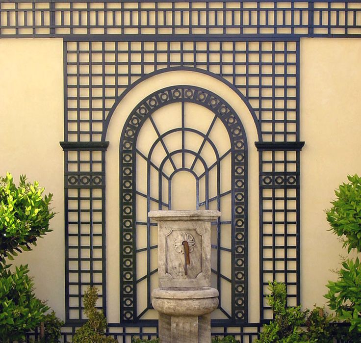 a building with a fountain in front of it