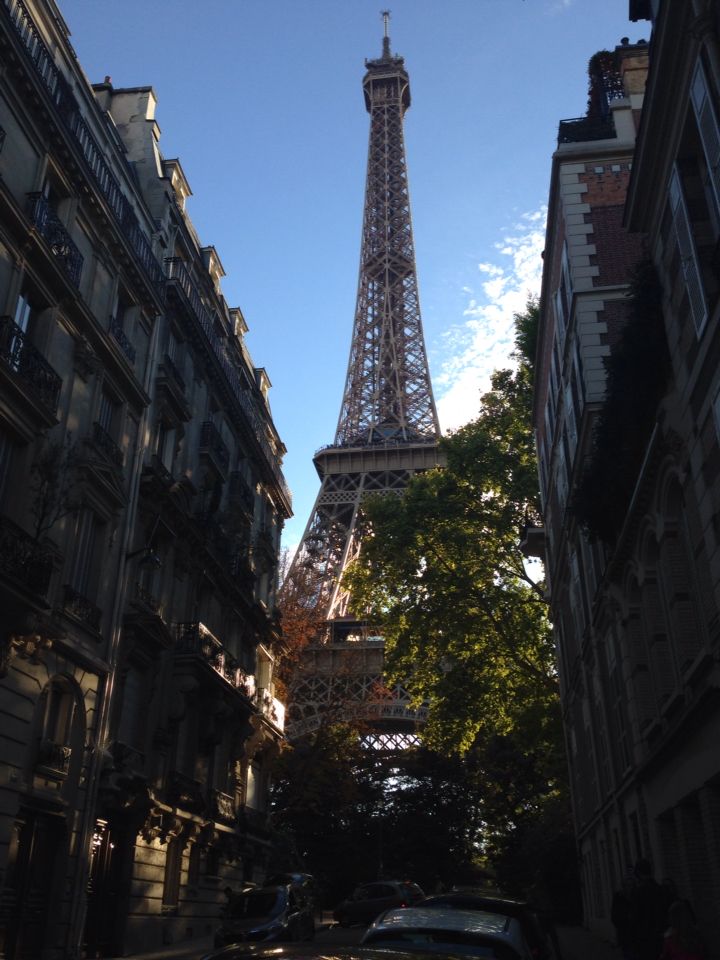 the eiffel tower towering over other tall buildings