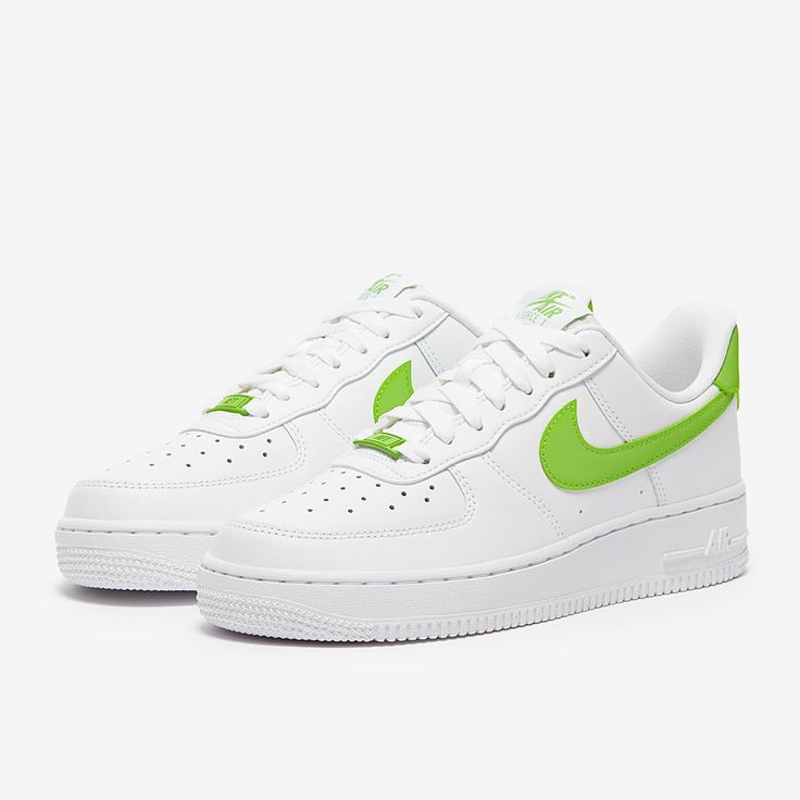 You dont mess with perfection and thats why the design of the Nike Sportswear Womens Air Force 1 07 in WhiteAction Green has barely changed since its original launch. Step into premium leather, subtle colours and a whole history of street style. The Nike Sportswear Womens Air Force 1 3907 has a low top design that keeps the legend alive, staying true to the original with its timeless silhouette, toe perforations and premium leather uppers for that classic hoops style, while updating it with mode Womens Air Force 1, Running Spikes, Green Trainers, Air Forces, Heritage Fashion, Basketball Sneakers, Air Force Ones, Nike Sports, Stitching Leather