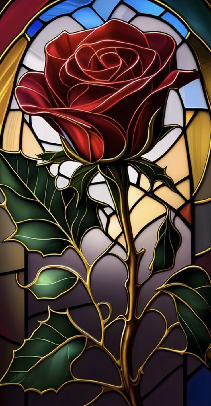 a stained glass window with a rose in it