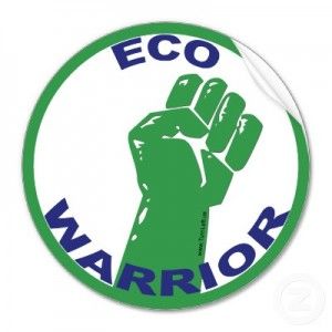 a green sticker with the words eco warrior written on it and a fist in the middle