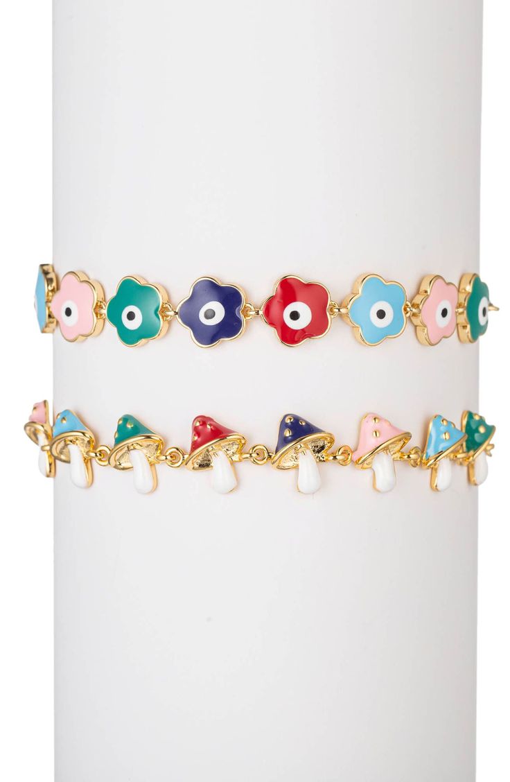 Protect your vibes with a pair of charming evil-eye and mushroom bracelets featuring links of flower blossoms mushrooms filled with colorful enamel. Set of two Lobster clasp Goldtone plate/enamel Imported Enamel Charms Bracelet, Mushroom Bracelet, Gold Enamel Bracelets With Charms, Playful Adjustable Multicolor Charm Bracelet, Mushroom Charm Bracelet, Enamel Charms, Accessories Bracelets, Blossom Flower, Keep Jewelry