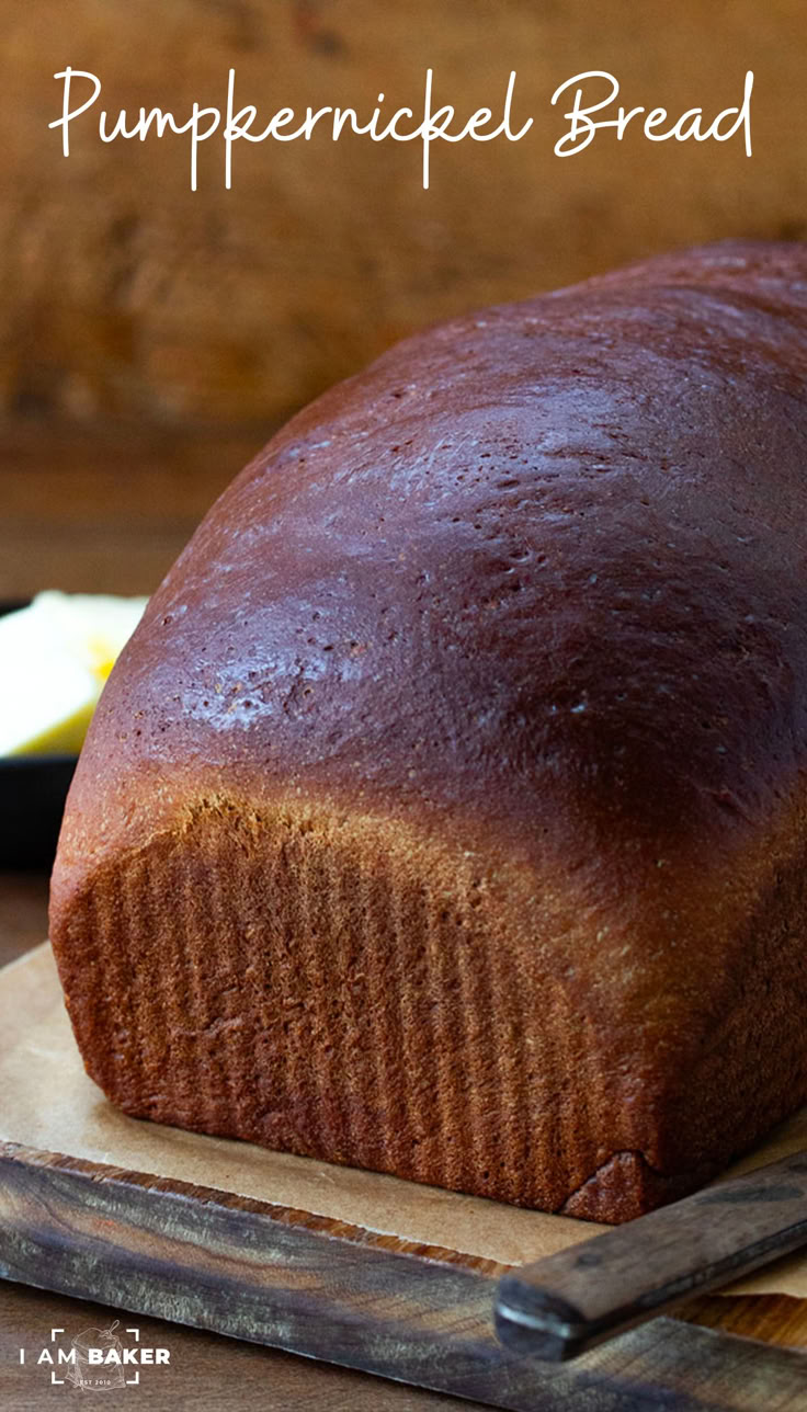 a loaf of pumpkin bread sitting on top of a cutting board