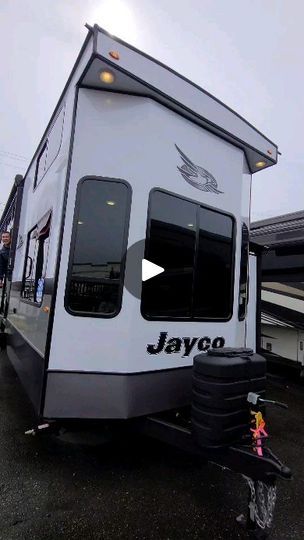 the jayco travel trailer is parked in a lot