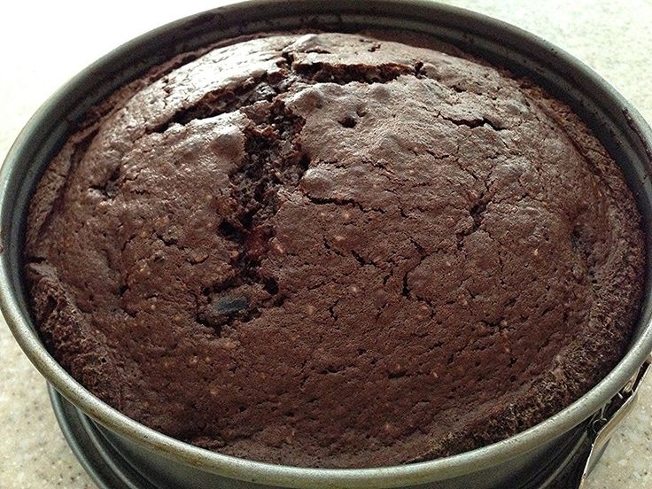 a chocolate cake sitting in a metal pan