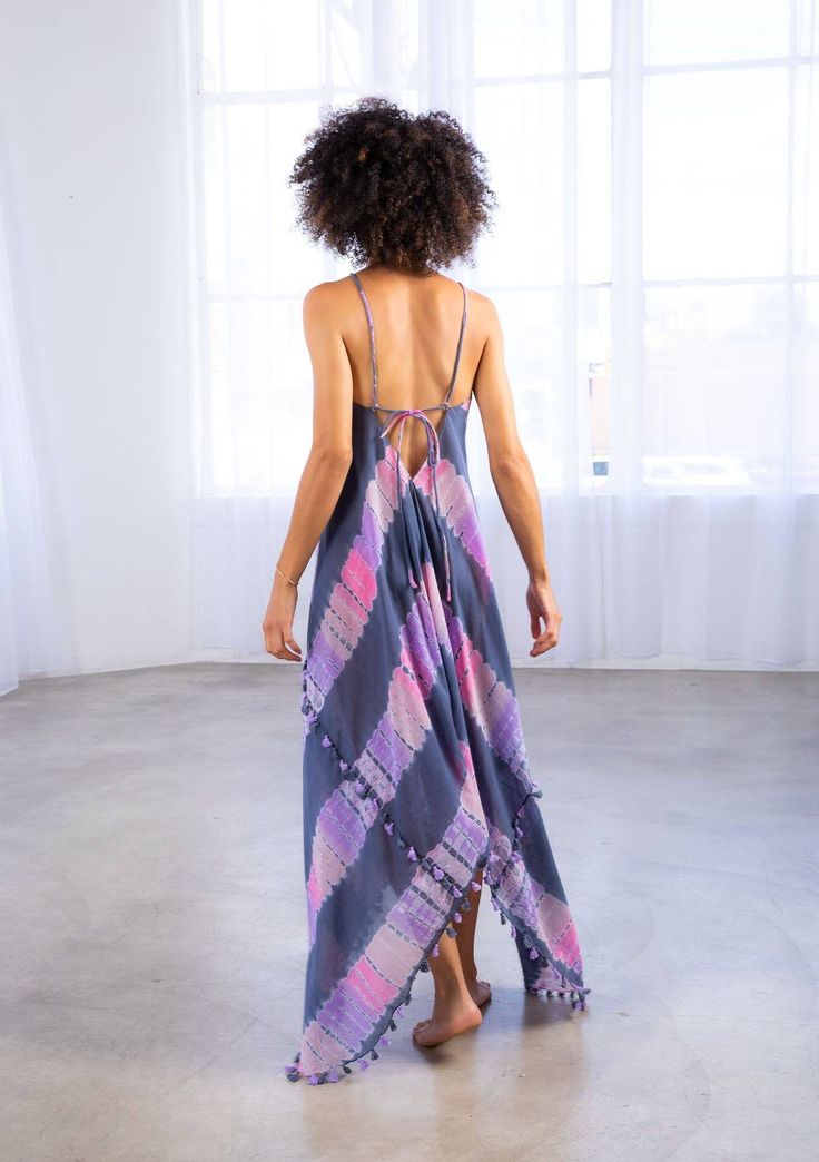 Warm weather is calling and we're ready with our tie-dye scarf dress. Featuring a flirty handkerchief hemline, front keyhole detail, and sexy strappy back, this sheer cotton dress is perfect thrown over your swimsuit. FINAL SALE Sleeveless Maxi length Asymmetrical hemline Mini tassel trim Adjustable spaghetti straps Model is 5'8, wearing a size S/M.Style: I-70465W-PMQ Tie Dye Scarf, Moroccan Boho, Tie Dye Scarves, Boho Beach Dress, Tie Dye Outfits, Tassel Dress, Scarf Dress, Cotton Scarf, Festival Dress