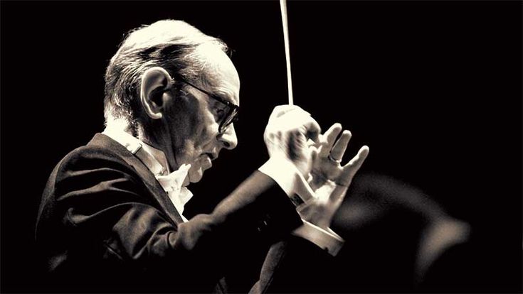 an older man is playing the violin in black and white with text overlay that reads,