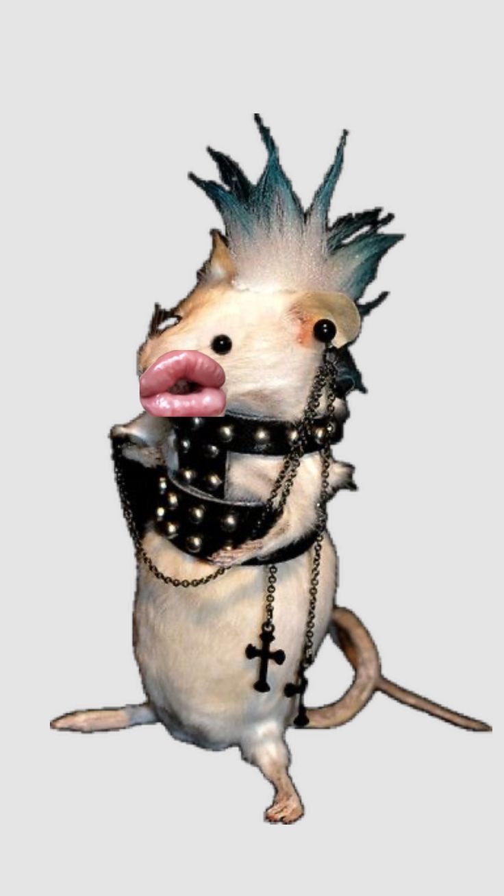 an animal with spikes and chains on it's head