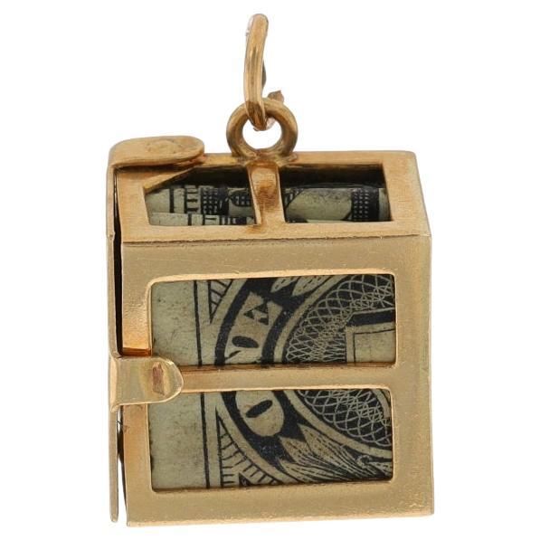 Metal Content: 14k Yellow Gold Theme: Mad Money, Emergency $1 Bill, U.S. Currency Features: Open Cut Detailing, Charm Opens to Access Dollar Measurements Tall (from stationary bail): 21/32" (16mm) Wide: 17/32" (13.1mm) Interior of top bail opening measures (east to west): 2.3mm Weight: 3.7 Grams Stamps: 14k Condition: Pre-Owned Professionally tested to guarantee metal content. Chinese Panda, Mad Money, Wedding Pendant, Gold Theme, Gold Charms, Gold Nugget, Metallica, Etsy Gift Card, Yellow Gold