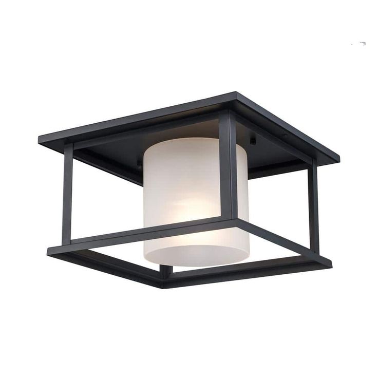 an outdoor light fixture with a white glass shade on the top and black metal frame