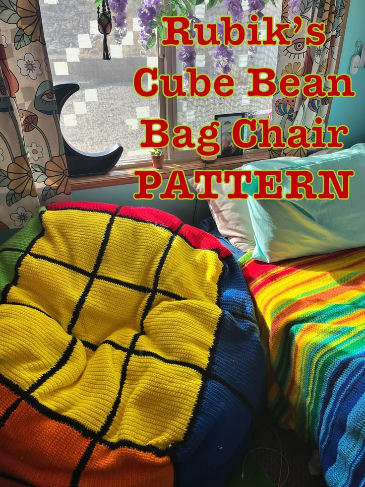 there is a bean bag chair in front of the window with text that reads rubik's cube bean bag chair pattern