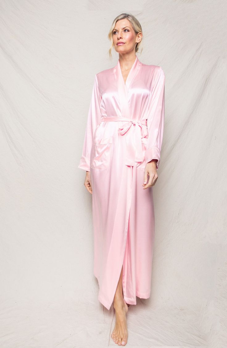 Exude elegance through your morning and nighttime routines in this luxurious robe sewn from fluid silk. Shawl collar Long sleeves Front patch pockets Removable tie belt 100% silk Dry clean Imported Pink Silk Robe, Silk Bathrobe, Silk Robe Long, Luxury Sleepwear, Classic Pajamas, Silk Dress Long, Silk Robe, Color Crush, Luxury Silk