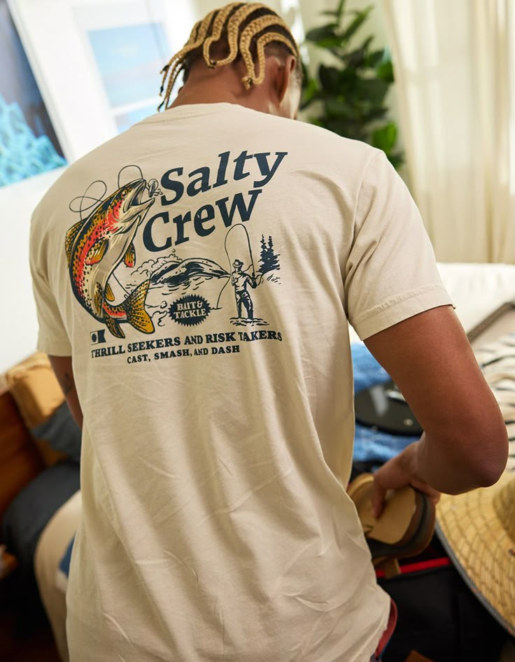 Salty Crew Sneak Away Tee. Graphic On Left Chest. Large Graphic On Back. Clamp Label On Left Sleeve. Crew Neck. Short Sleeve. 100% Cotton. Machine Wash. Imported. Graphic T Shirts Men, Trendy Graphic Tees Men, Vintage Graphic Tees Men, Men's Graphic Tee, Guys Graphic Tees, Outdoor Graphic Tees, Men’s Graphic Tee, Boat Outfit Men, Men’s Graphic Tees