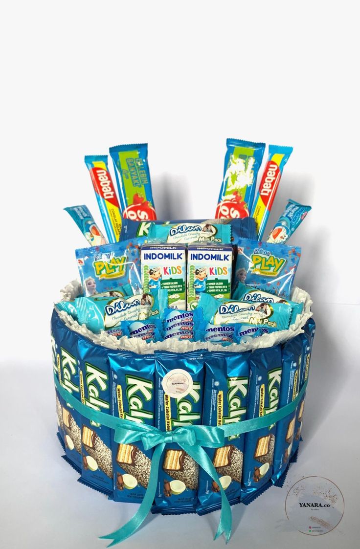 a blue basket filled with lots of candy