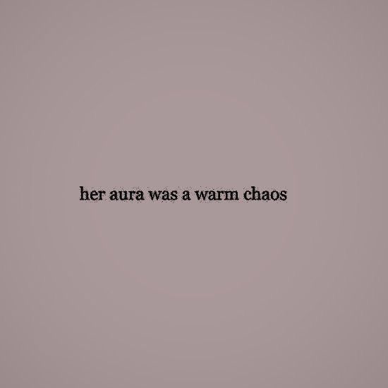 the words her aura was a warm chaos against a gray background with black text on it