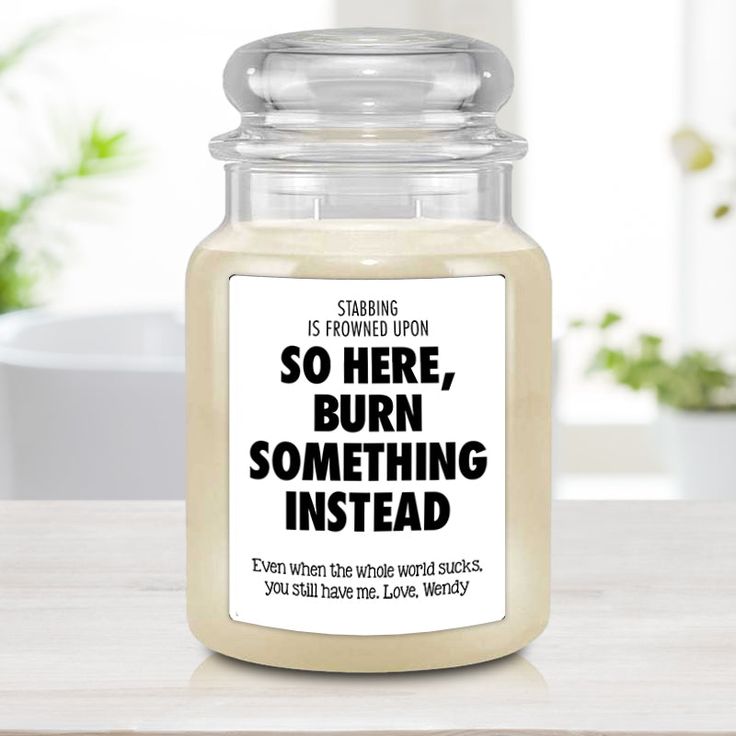 a jar with a quote on it sitting on a table