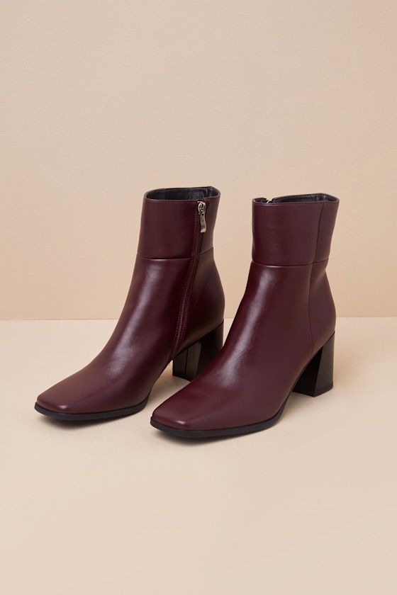 The Lulus Layten Wine Square Toe Ankle Boots are the perfect addition to your fall wardrobe! These must-have boots have a smooth faux leather construction that shapes a square-toe upper that rises to an ankle-high shaft with stylish seam detailing. A 7"" zipper at the instep makes for easy on-and-off, while a sturdy block heel completes the design! 2. 5" block heel. Cushioned insole. Rubber sole has nonskid markings. Man Made Materials. Imported. Lulus | Layten Wine Square Toe Ankle High Heel Bo Business Casual Boots, Infires Man, Ankle High Heel Boots, Burgundy Ankle Boots, Classy Boots, Maroon Boots, Maroon Shoes, Shoe Goals, Burgundy Boots Ankle