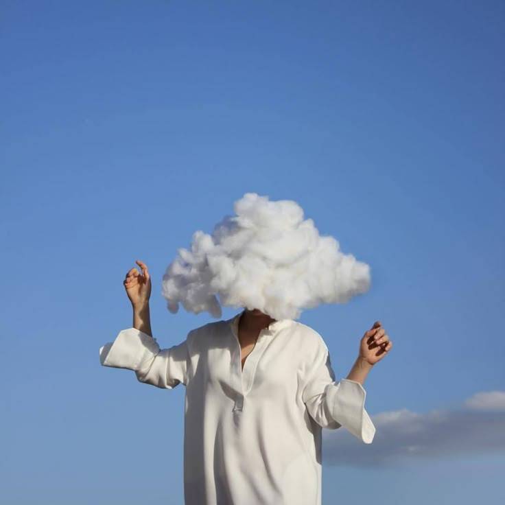 a person with a cloud over their head