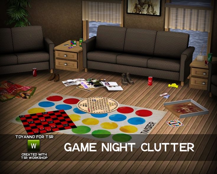 a game night clutter is on the floor in a living room with two couches