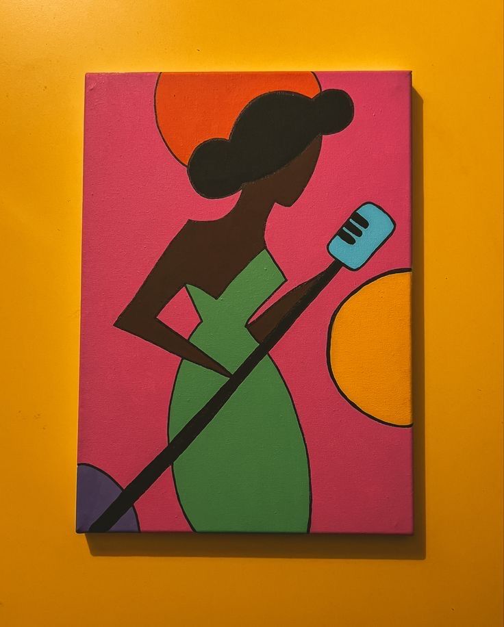 a painting on a wall with a woman holding a brush in her hand and an orange background