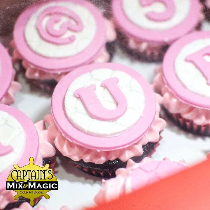 cupcakes decorated with pink and white frosting