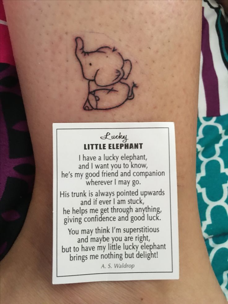 a little elephant tattoo on the back of a woman's leg with a poem written below it