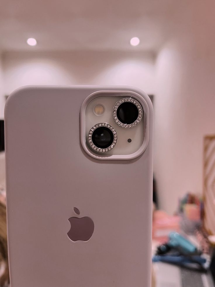 an apple phone is displayed in a store