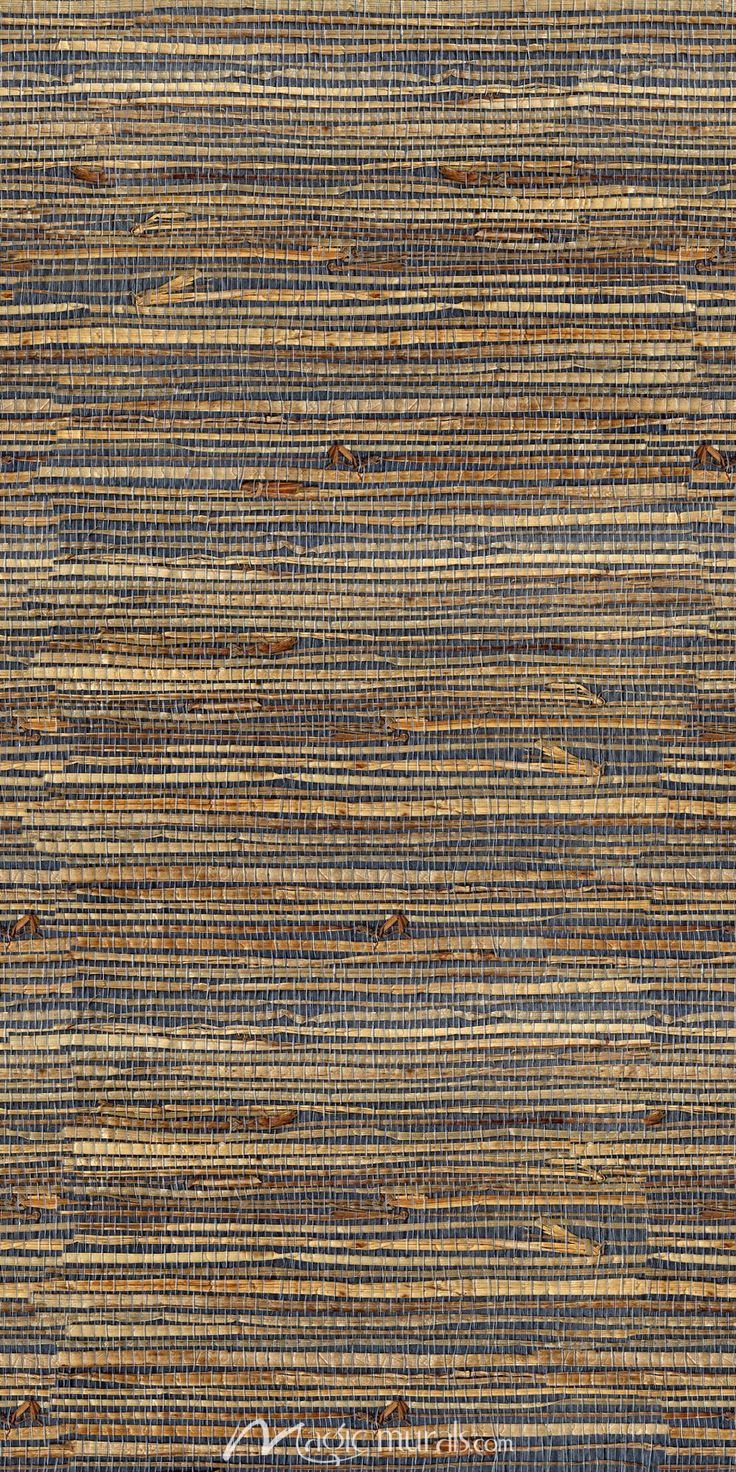 an upholstered blue and brown rug with vertical stripes on it's surface