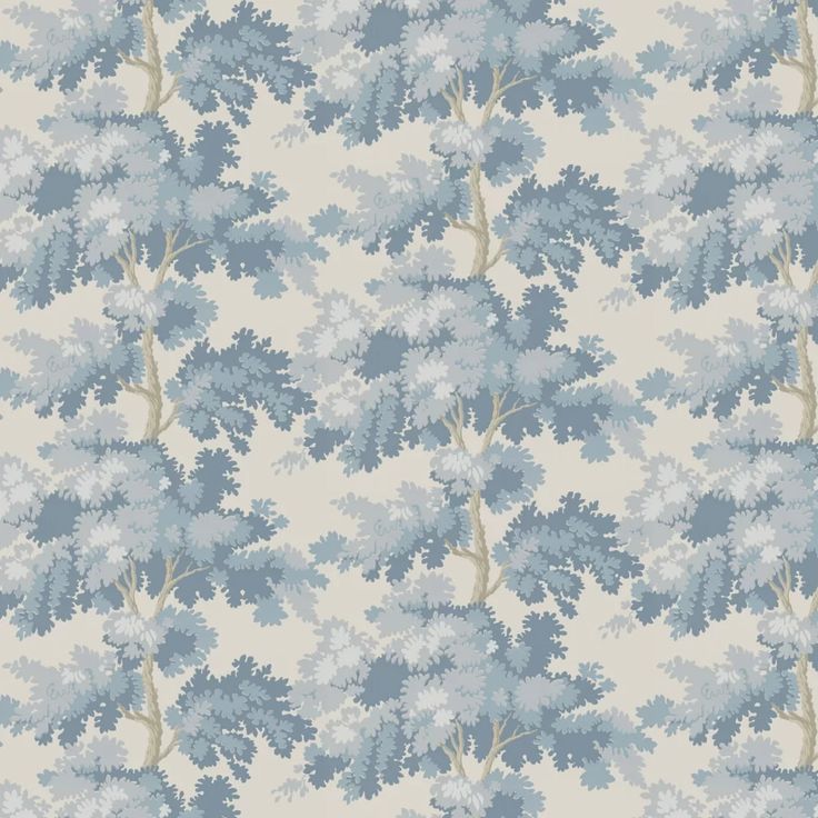 a blue and white wallpaper with trees on it