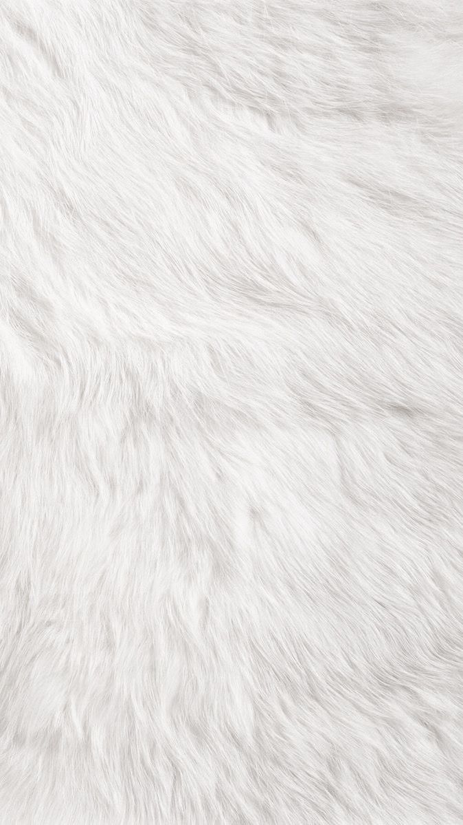 the white fur texture is very soft and fluffy, but it doesn't look like any