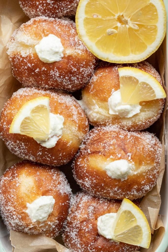 lemon donuts with powdered sugar on top