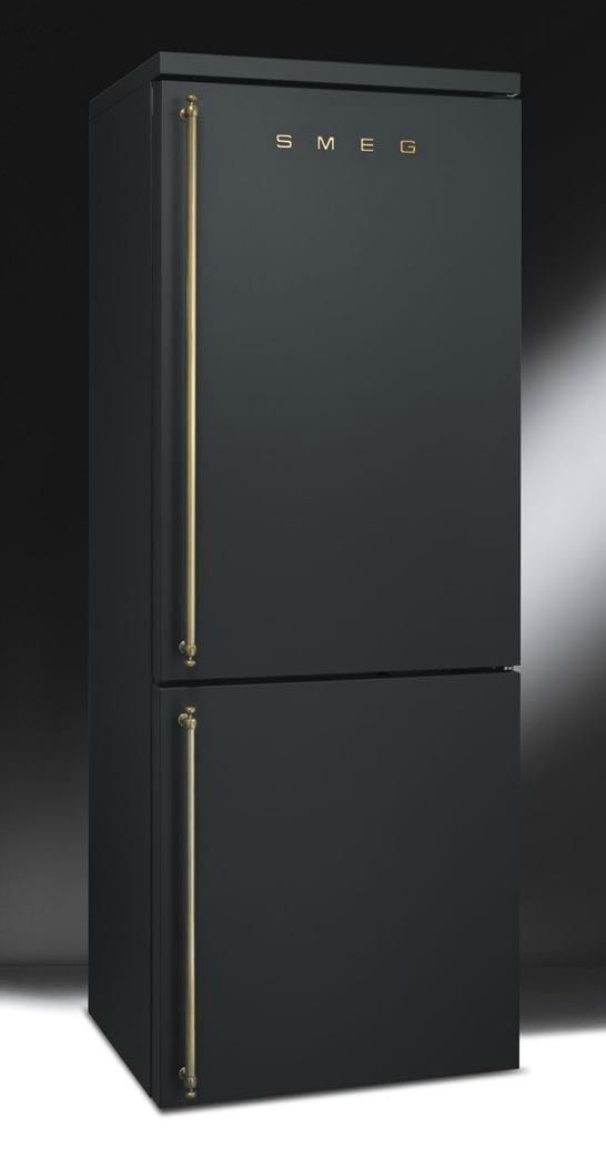 a black refrigerator freezer sitting on top of a white floor next to a wall