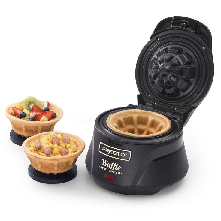 the waffle maker has three different types of food in it's trays