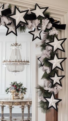 a christmas wreath with black and white stars