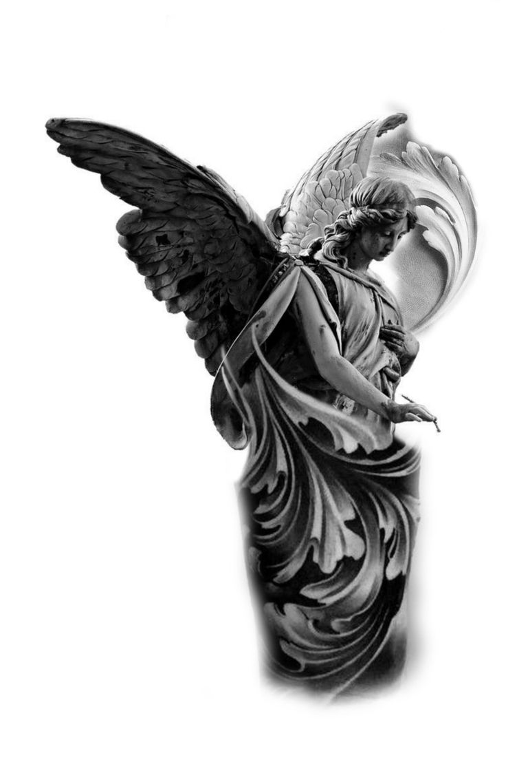 an angel figurine sitting on top of a vase