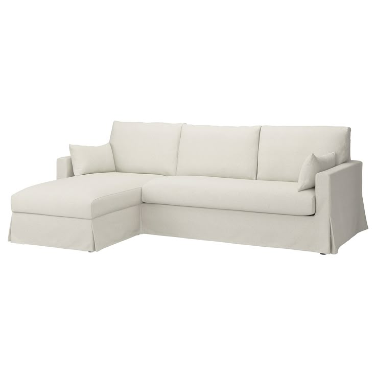 a white couch with pillows on it