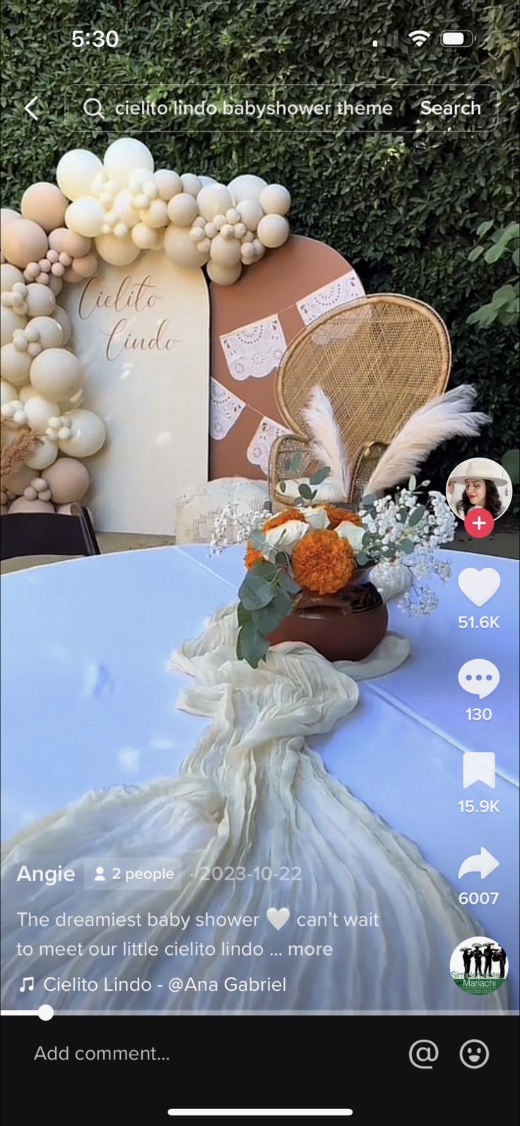 an image of a table setting with flowers and feathers on it's headband