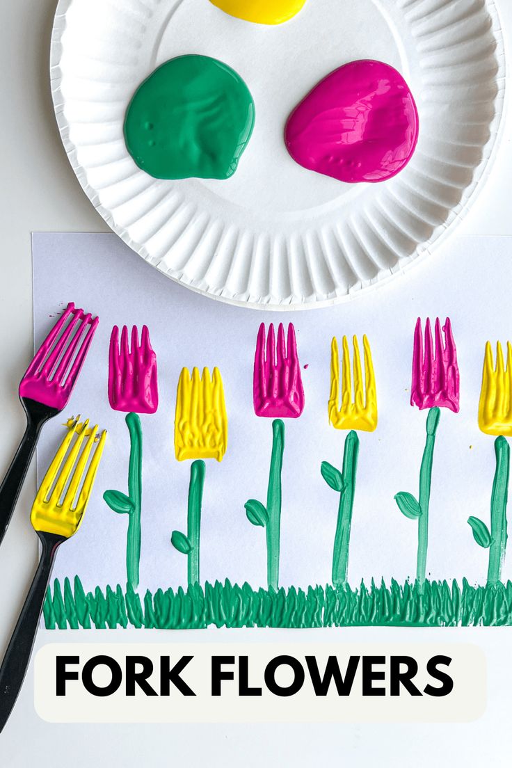 paper plate with fork flowers on it and the words fork flowers in front of it