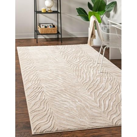 a white rug with wavy lines on it