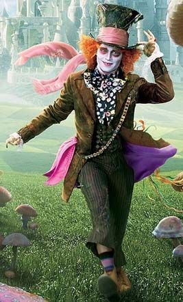 there is a man dressed as the mad hatter running in front of some mushrooms