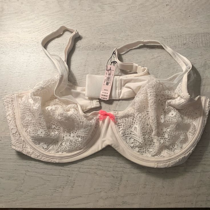 White Lace W/ Pink Bow Detail White Underwire Bra With Lace Trim, White Feminine Bra With Lace Trim, White Lace Bra Feminine Style, White Lace Feminine Bra, White Fitted Feminine Bra, Feminine White Underwire Bra, Victoria's Secret White Padded Bra, Fitted White Bra With Lace Trim, White Fitted Underwire Bra