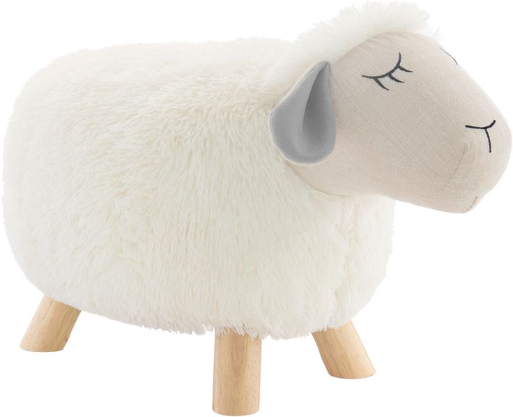 a white sheep toy sitting on top of a wooden stand with its eyes closed and one eye closed