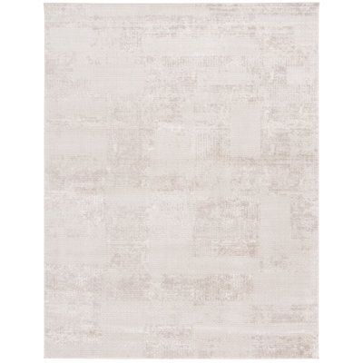 a white rug with an abstract design on the top and bottom, in shades of beige