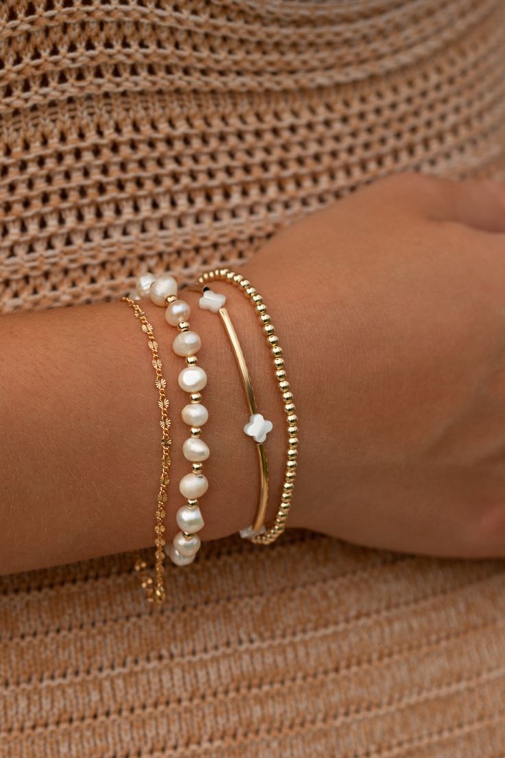 14k gold filled and freshwater pearls School Jewelry Ideas, Gold And Pearls Jewelry, Cute Gold Jewelry Aesthetic, Jewerly Stacks Gold, Gold 14k Gold-filled Round Beads Pearl Bracelet, Everyday Gold Bracelet Stack, Dainty Adjustable Beaded Bracelets With Pearl Chain, Gold-plated Jewelry With Pearl Charm, Yellow Gold Plated Jewelry With Pearl Charm