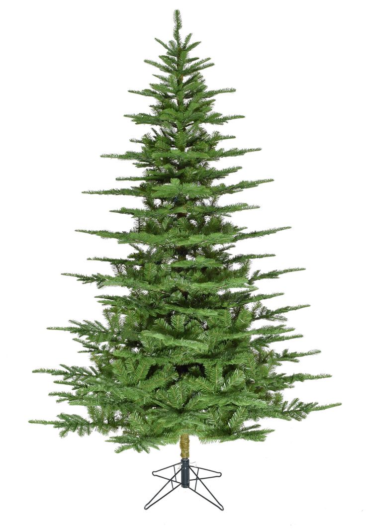 a small green christmas tree on a stand