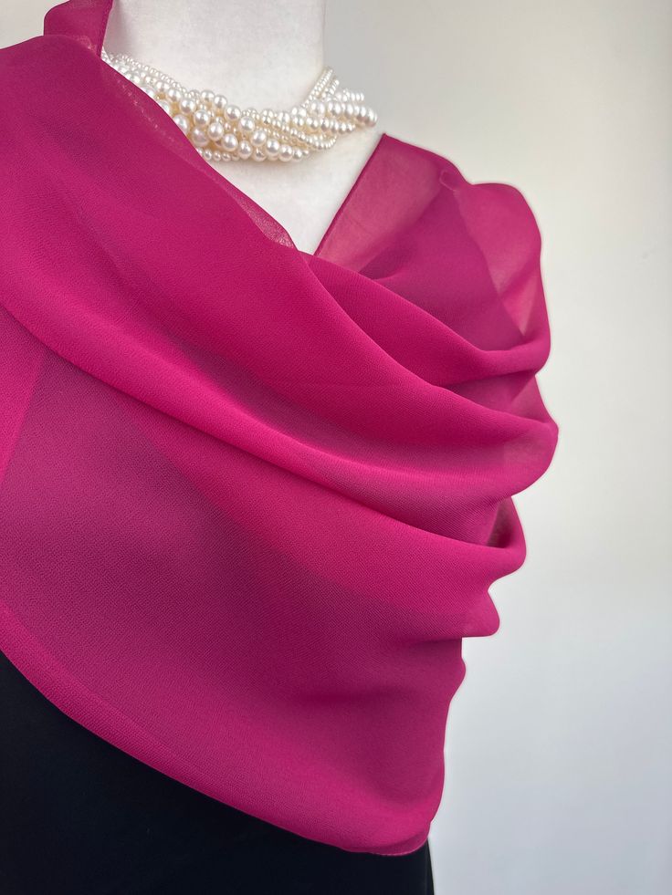 Elevate your style with our exquisite collection of chiffon shawls. Our chiffon shawls are the epitome of elegance and versatility, designed to effortlessly enhance your wardrobe and leave a lasting impression. Made from the fine poly chiffon fabric, these shawls offer a delicate and airy drape that adds a touch of grace to any outfit. Whether you're attending a special occasion, a casual gathering, or simply want to elevate your everyday look, our chiffon shawls are the perfect accessory. Choos Chic Pink Scarf As Gift, Chic Pink Silk Scarf For Formal Occasions, Chic Formal Silk Shawl Scarf, Elegant Sheer Shawl For Parties, Formal Shawl Wrap Scarf, Chiffon Silk Scarf For Weddings, Elegant Organza Shawl For Evening, Elegant Sheer Shawl For Evening, Elegant Chiffon Shawl