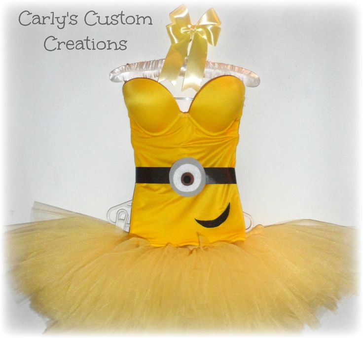 a yellow and black dress with an eyeball on it