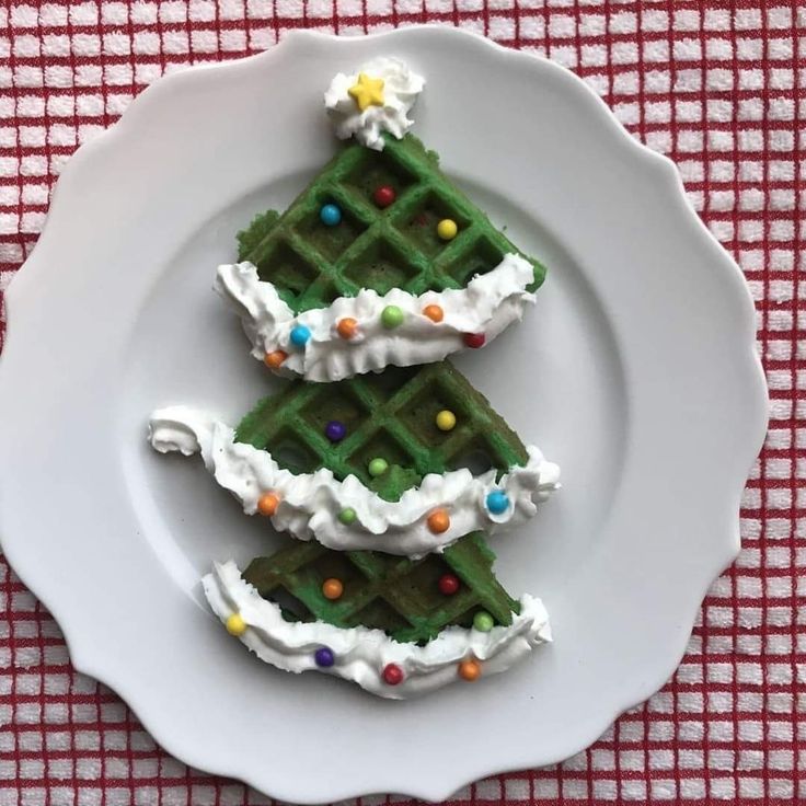 three waffle christmas trees on a white plate