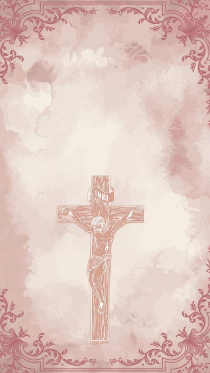 the crucifix is in front of a pink background with scrolls and swirls