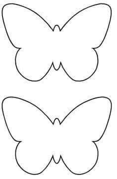 two butterflies cut out to look like they are facing each other